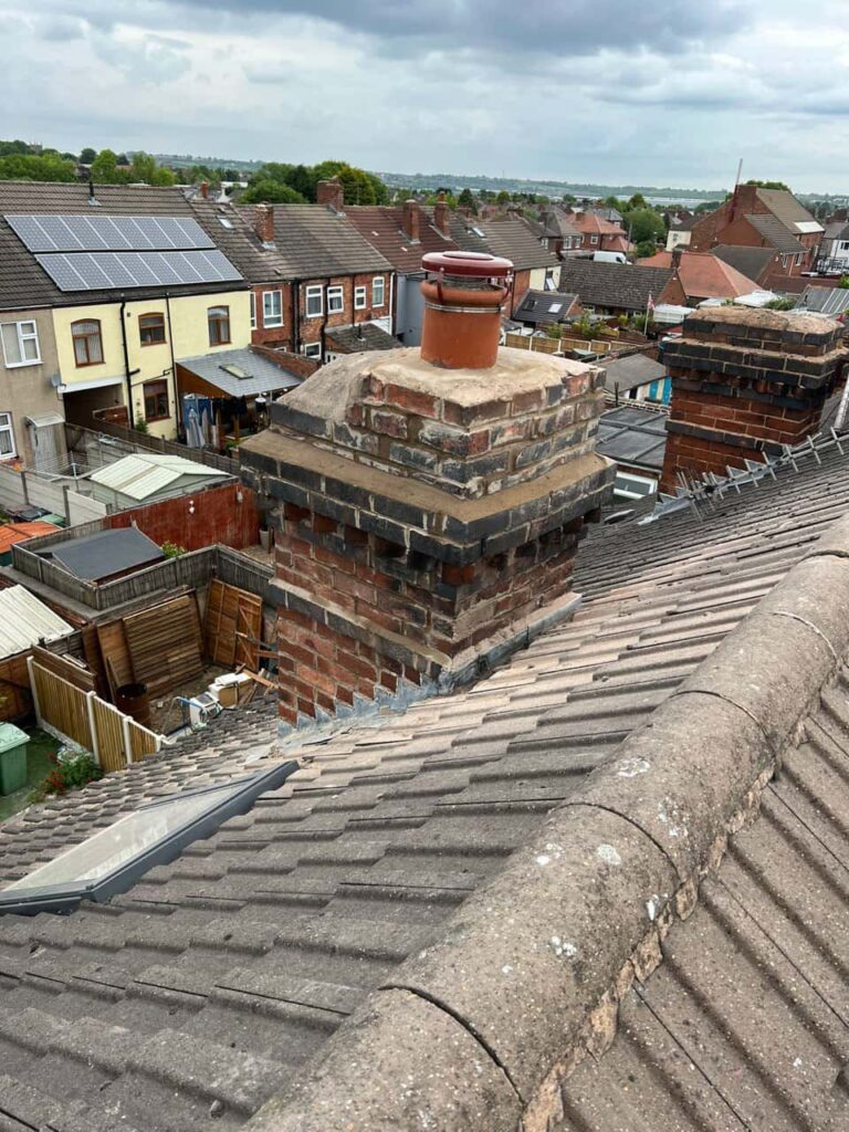 This is a photo taken from a roof which is being repaired by Broughton Astley Roofing Repairs, it shows a street of houses, and their roofs